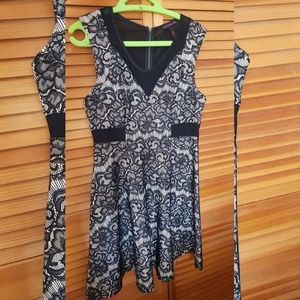 Black and while Material Girl dress.